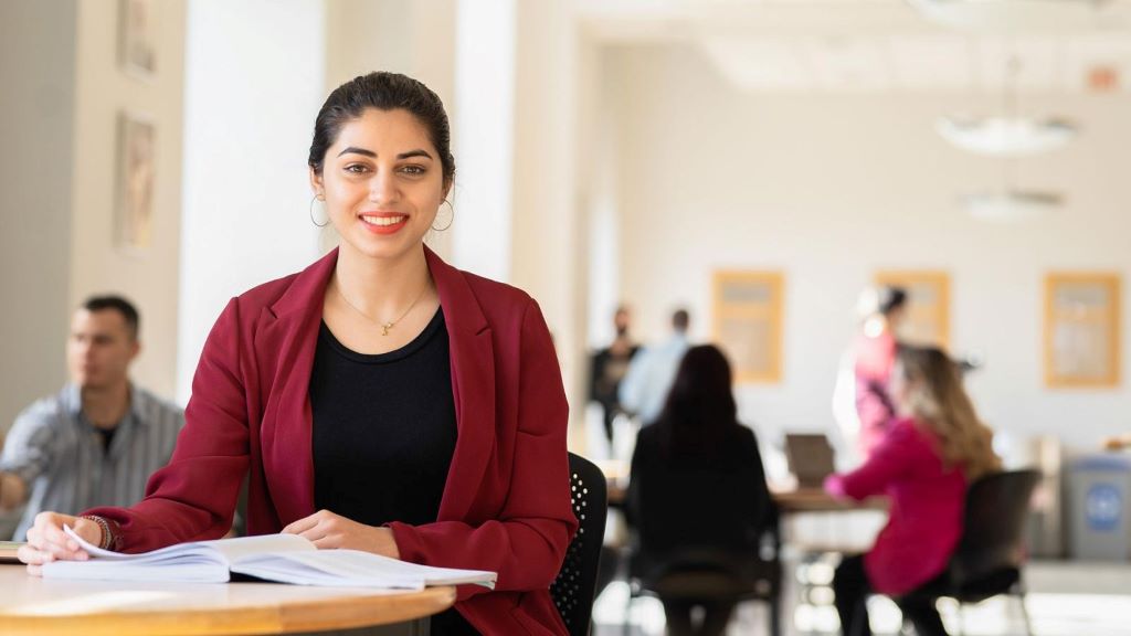 Business graduate weighing marketing vs accounting degree options for long-term career stability and success